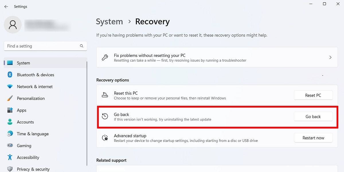 "Go back" option under Recovery in Windows.