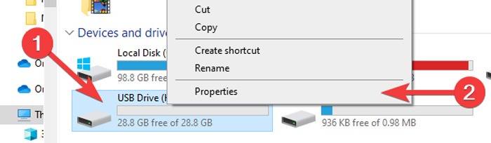 Right-clicking on drive in File Explorer to bring up context menu with "Properties" option. 