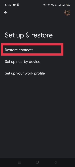 Tapping "Restore contacts" under Google settings.