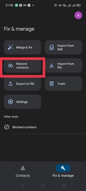 Tapping on "Restore contacts" in the Google Contacts app. 