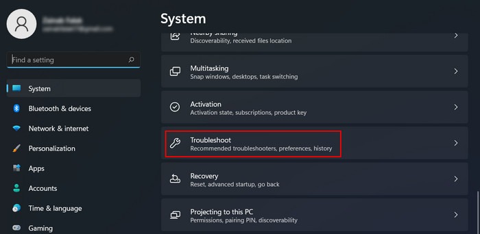 Clicking on "Troubleshoot" option under System in Settings. 