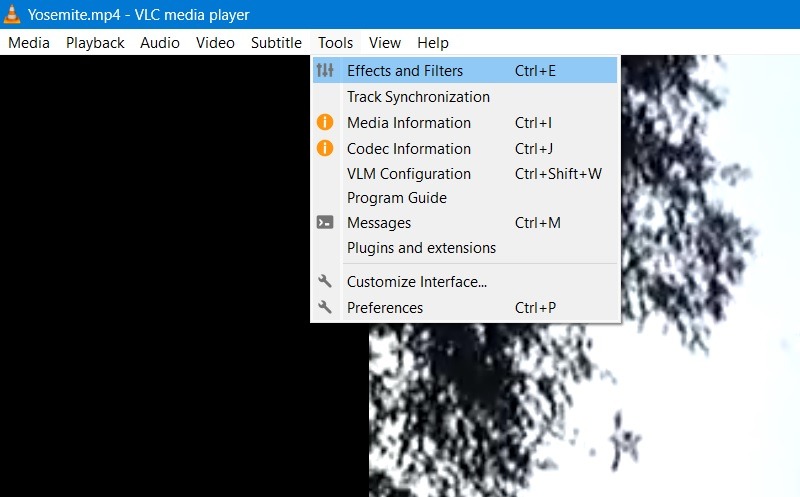 Select "Tools > Effects and Filters" in VLC Media Player. 