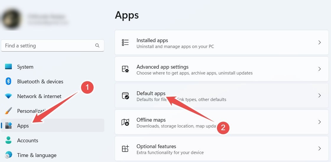 Navigating to "Default apps" in Windows 11 settings.
